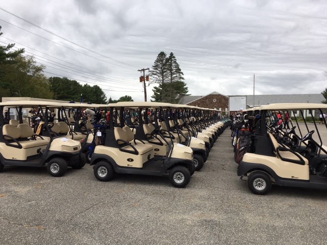 rows of carts ready for golf event